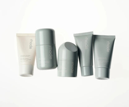 THE TRAVEL SET five-piece mini skincare set by Rhode - portable travel-size skincare essentials for hydrated glowing skin on-the-go